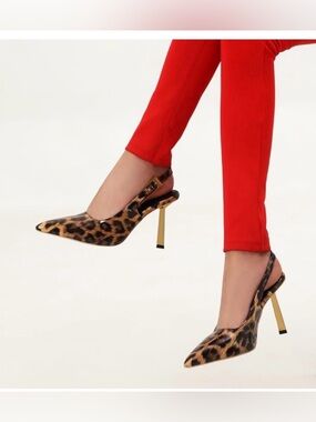 faux patent leopard sling back heels/ gold buckle and heel. Size 6